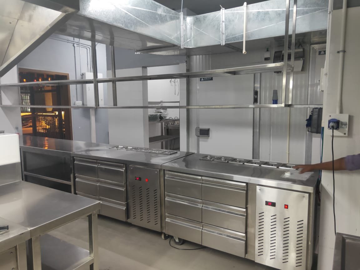 Commercial kitchen cold counter installation